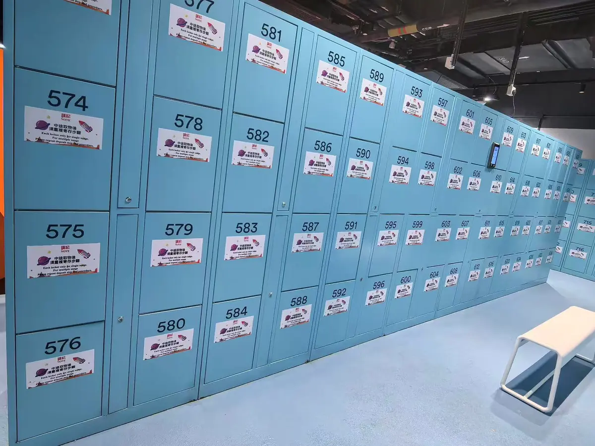 Rows of numbered WhizSmart smart lockers installed in a water park changing area